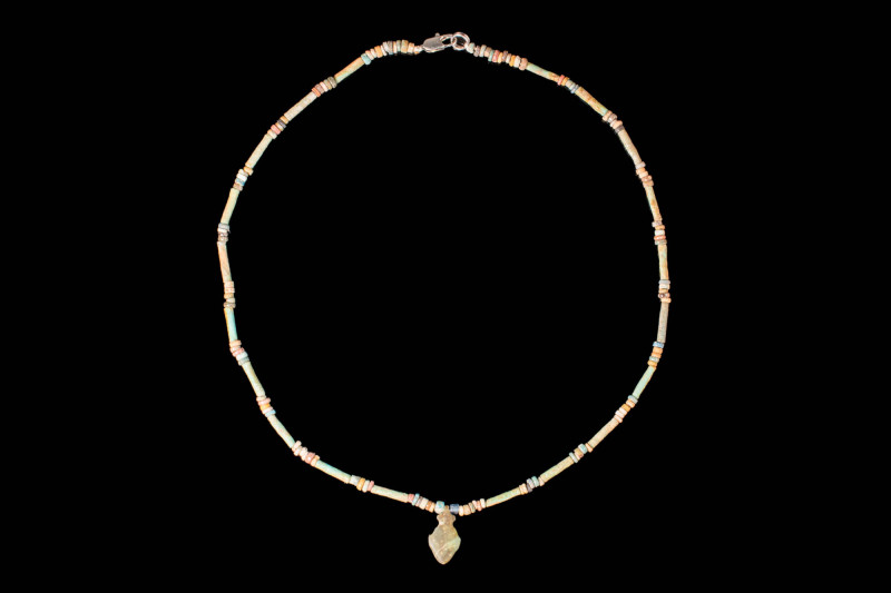 EGYPTIAN LATE PERIOD NECKLACE WITH STONE PENDANT

 Ca. 664 - 332 BC An Egyptia...