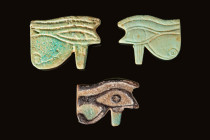 SET OF EGYPTIAN FAIENCE EYE OF HORUS AMULETS

 Third Intermediate Period-Late Period, Ca. 1069 - 332 BC A group of 3 mould-formed faience eye amulet...