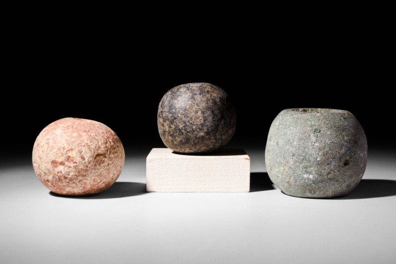 GROUP OF EGYPTIAN STONE MACE HEADS

 Ca. 3100 - 2900 BC A set of 3 Egyptian ca...