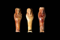 GROUP OF THREE EGYPTIAN BROWN FAIENCE USHABTI

 Late Period - Ptolemaic Period, Ca. 664 - 30 BC A set of Egyptian faience ushabti figures. The three...