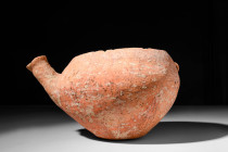 CYPRIOT / HOLY LANDS TERRACOTTA VESSEL WITH SPOUT

 Ca. 3300 - 2000 BC A cypriot terracotta vessel featuring a squat, rounded body with a flat base,...