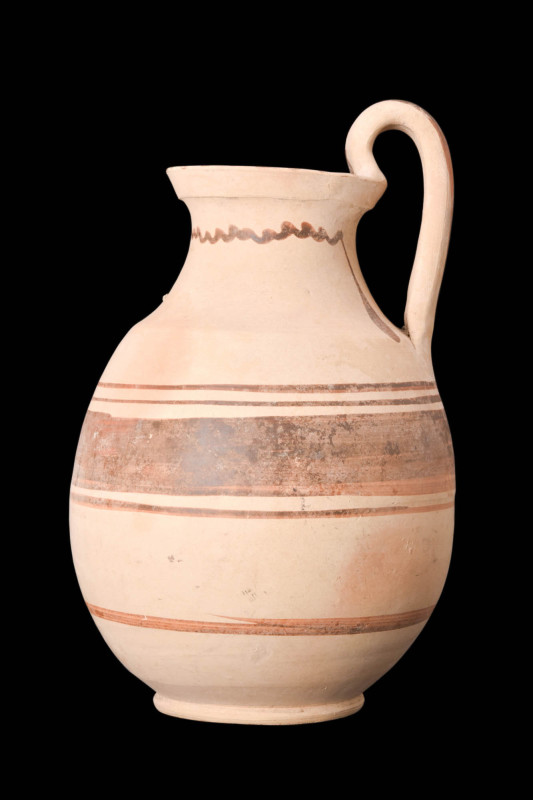 DAUNIAN POTTERY OLPE

 Ca. 600 - 500 BC A beautiful olpe featuring an elongate...