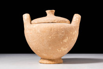 A GREEK POTTERY FUNERARY URN

 Ca. 500 - 400 BC A Greek pottery funerary urn comprising of a globular body seated on a short pedestal, round shoulde...