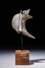 GREEK ARCHAIC BRONZE HORSE PROTOME 

 Ca. 900 - 700 BC A striking cast bronze horse or gryphon protome. This head and neck was once probably part of...