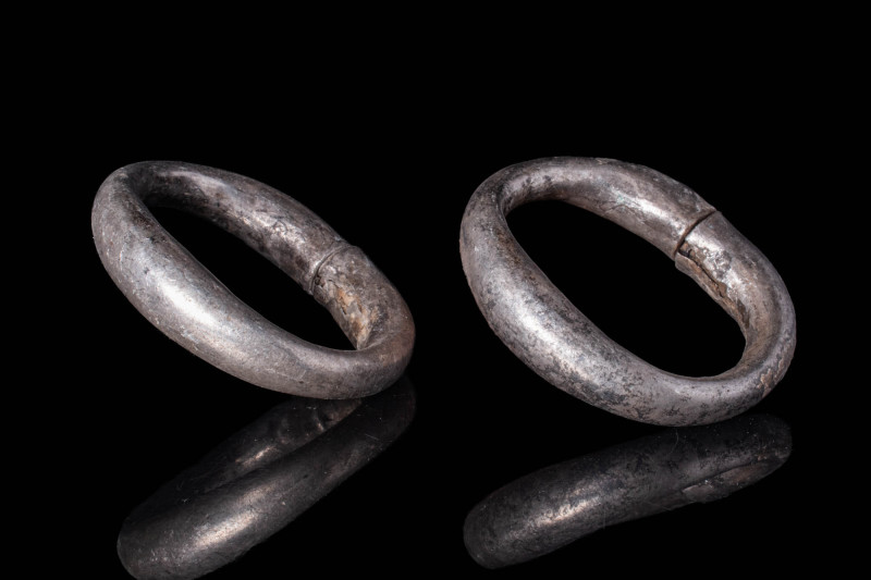 PAIR OF HEAVY CELTIC SILVER BRACELETS

 Ca. 300 BC A pair of Celtic silver bra...