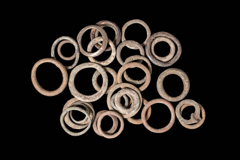 LARGE GROUP OF CELTIC BRONZE PROTO MONEY RINGS 

 Ca. 300 - 100 BC A large gro...