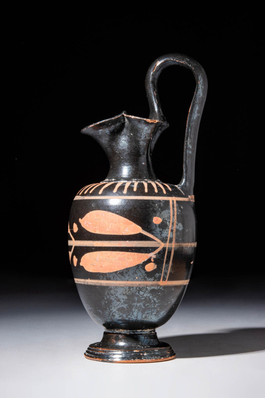 APULIAN XENON WARE TREFOIL OINOCHOE 

 Ca. 350 - 300 BC An Apulian xenon-ware ...