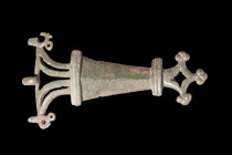 IRON AGE BRONZE BROOCH WITH OPENWORK CROSS

 Ca. 200 BC - AD 100 An Iron age bronze brooch with an openwork cross on the top and body composed of th...