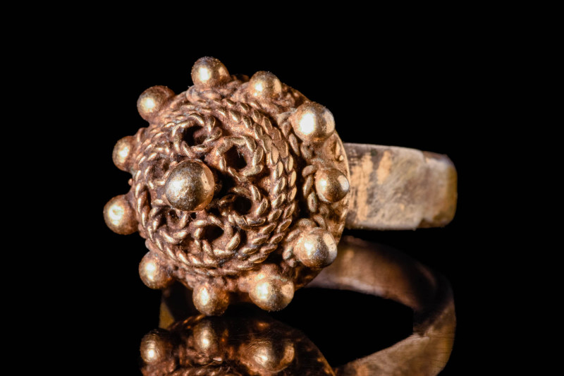 BYZANTINE SILVER GILT RING WITH FLOWER SHAPED BEZEL

 Ca. AD 700 - 900 A Byzan...