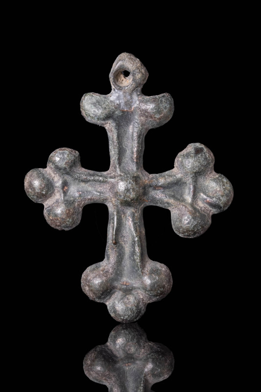 MEDIEVAL BRONZE CROSS PENDANT WITH FLOWER SHAPED ARMS

 Ca. AD 800 - 1000 A By...