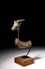 ACHAEMENID BRONZE DEER RHYTON PROTOME ON STAND 

 Ca. 500 - 400 BC An exquisite Achaemenid bronze rhythm, a deer shape. The slender neck tapers from...