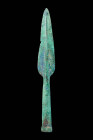 BRONZE AGE SOCKETED SPEARHEAD

 Ca. 1200 - 800 BC A Bronze Age spearhead featuring a leaf shaped blade with a slightly raised midrib, leading to a l...