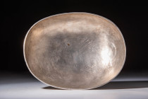 SASANIAN SILVER OVAL SHALLOW BOWL

 Ca. AD 400 - 600 An elongated Sassanian shallow bowl made from silver. For similar see: Christie's, Live Auction...