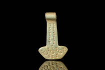 VIKING GOLD/ELECTRUM MJOLNIR THOR'S HAMMER PENDANT

 Ca. AD 800 - 1100 A Viking pendant depicting Mjolnir, the legendary hammer wielded by the Norse...