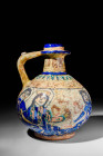 RARE MINA'I GLAZED POTTERY JUG

 Ca. AD 1200 A stunning Mina'i jug with globular body seated on a discoidal foot; narrow neck and short galleried ri...