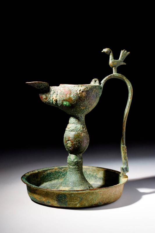 KHORASAN BRONZE OIL LAMP ON STAND

 Ca. AD 1100 - 1200 A pretty example of a c...