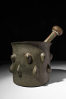 SELJUK BRONZE SPIKED MORTAR AND PESTEL

 Ca. AD 900 - 1100 An Islamic Seljuk mortar cast from bronze. The pestle is made via the lost wax technique ...