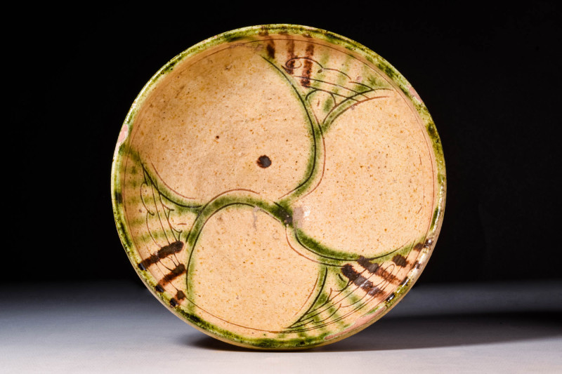 NISHAPUR GLAZED TERRACOTTA BOWL WITH GEOMETRIC MOTIF

 Ca. AD 900 - 1100 A Nis...