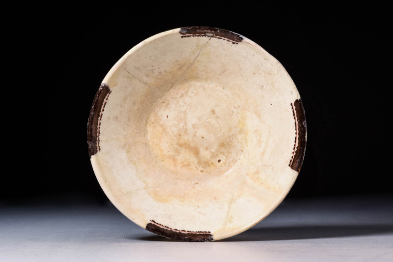 NISHAPUR POTTERY DISH WITH PSEUDO INSCRIPTIONS

 Ca. AD 900 - 1000 A Nishapur ...