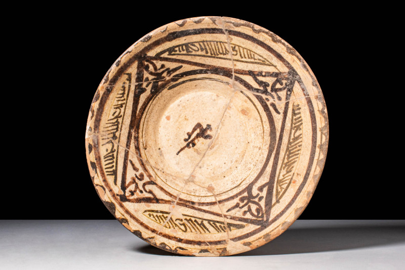 NISHAPUR GLAZED BOWL WITH PHYTOMORPHIC MOTIF

 Ca. AD 900 - 1000 A Nishapur gl...