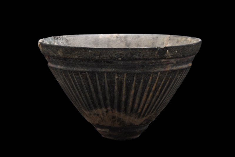 MIDDLE EASTERN BLACK STONE BOWL

 Ca. 600 - 400 BC A carved black stone bowl o...