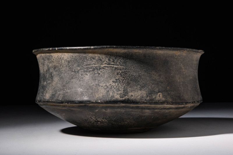 RARE MESOPOTAMIAN STONE CARINATED BOWL

 Ca. 2100 - 1800 BC An Mesopotamian st...