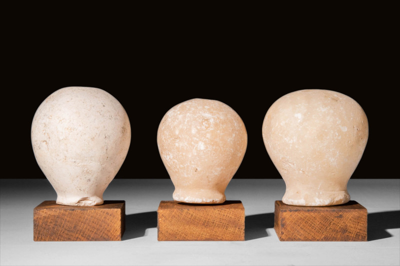 GROUP OF THREE NEAR EASTERN MARBLE MACES 

 Ca. 3rd-2nd Millennium BC A group ...