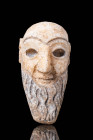 SUMERIAN STONE HEAD OF FIGURINE

 Ca. 2500 - 1800 BC A Sumerian finely sculpted head of a male worshipper in creamy white calcite stone. The head pr...
