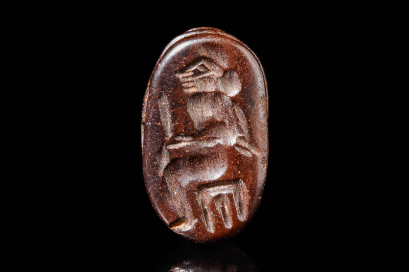 PARTHINIAN-SASANID RED STONE STAMP SEAL WITH SEATED MAN IN SCARAB SHAPE

 Ca. ...