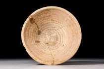 ARAMAIC TERRACOTTA INCANTATION DEVIL TRAP BOWL

 Ca. AD 600 - 800 A Judeo-Aramaic terracotta bowl featuring a gently pointed base and uniformly thic...