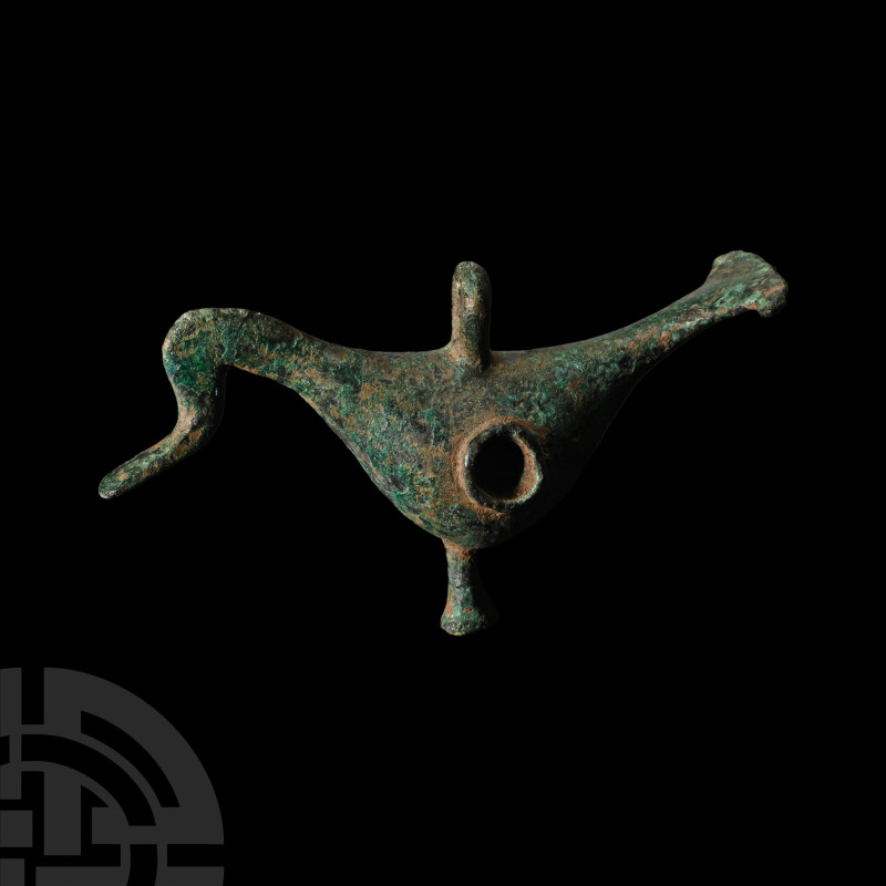 8th-7th century B.C.. Hollow-formed with lateral sockets, each with a low rim; p...