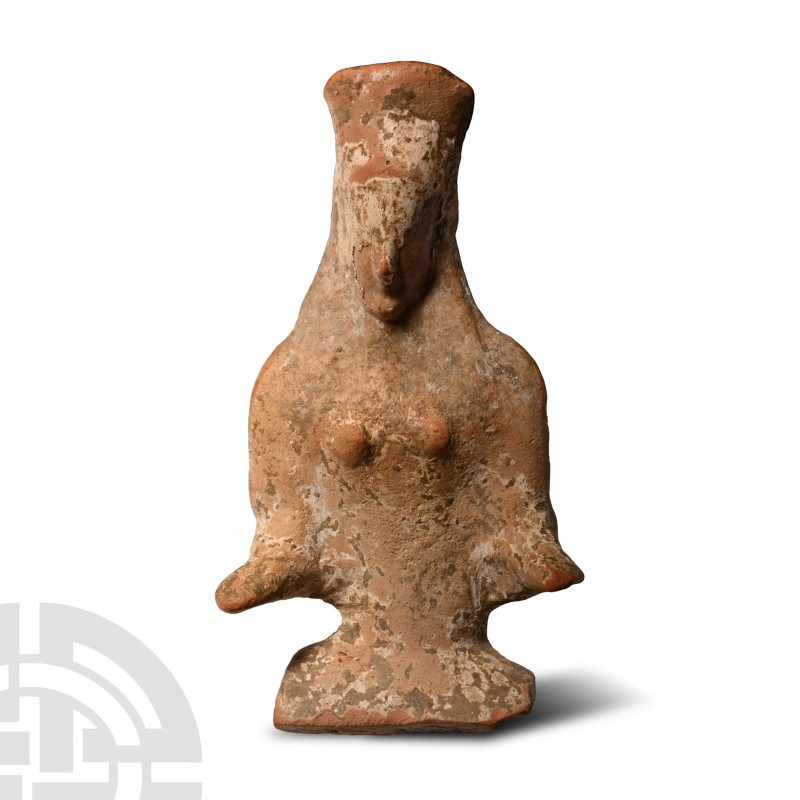 Archaic, 6th-5th century B.C.. Mould-made figure of a female upper body with tal...