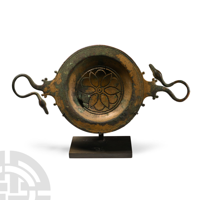 4th-3rd century B.C.. Comprising a shallow bowl and broad flange rim, two integr...