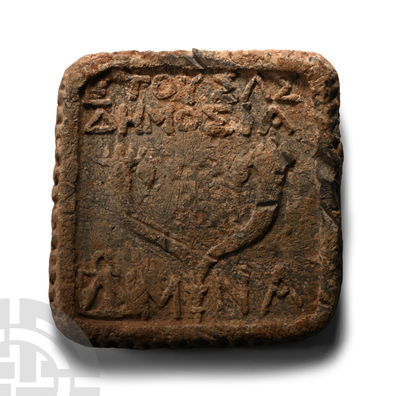 Dated SE 230 (83/2 B.C.). Square in plan with ribbed edge and hatched reverse; E...