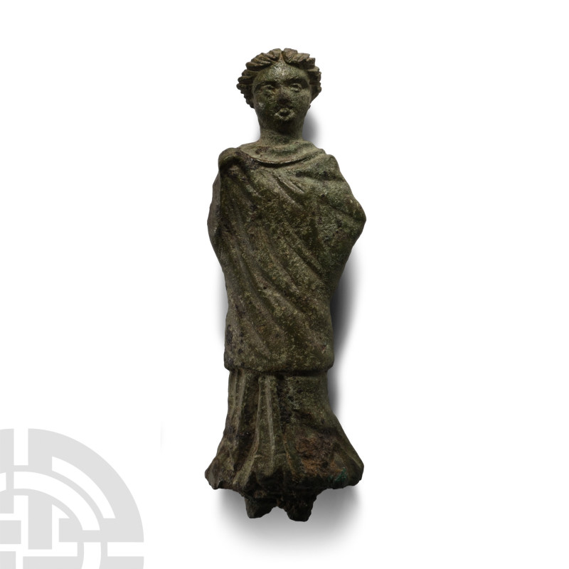 3rd-4th century A.D.. Female with hair drawn up in a chignon, palla wrapped tigh...