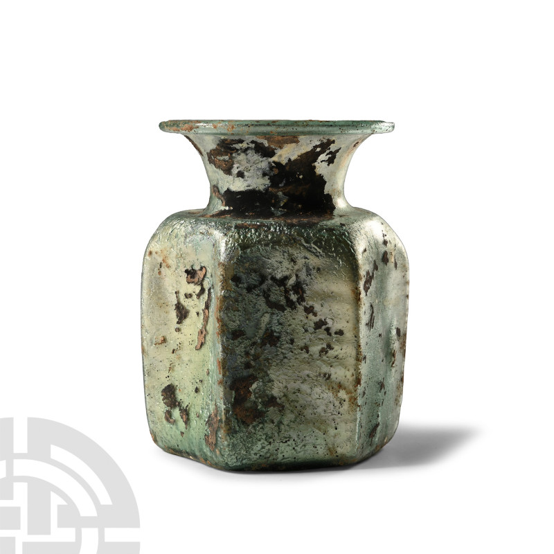 1st-3rd century A.D.. Squat hexagonal-section jar with pinched angles, flared mo...