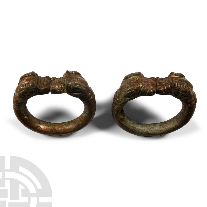 2nd millennium B.C.. Each armlet composed of a substantial round-section penannu...