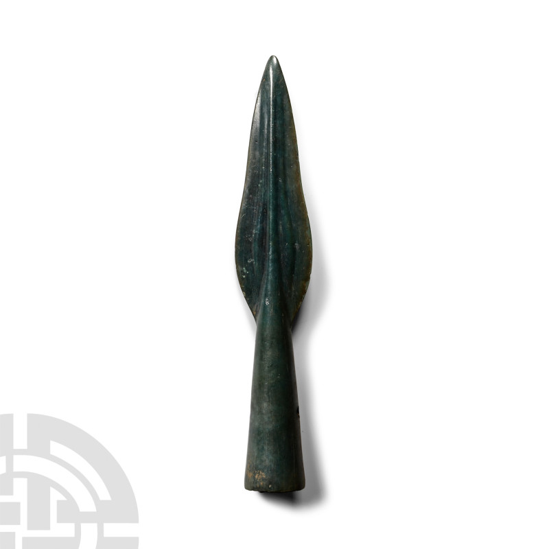 11th-10th century B.C.. With flared socket developing to a midrib with scooped l...