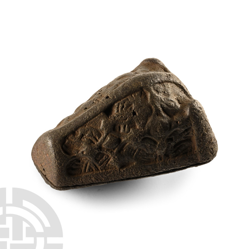 10th-11th century A.D.. Decorative upper surface attached to a plain back-plate ...