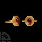 Large Medieval Gold Ring with Cabochon Garnet