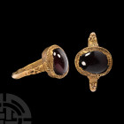 Medieval Gold Ring with Cabochon Garnet