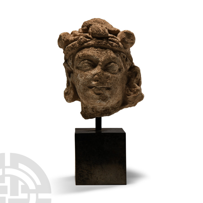 2nd-4th century A.D.. Head of a worshipper modelled in the round with wavy hair ...