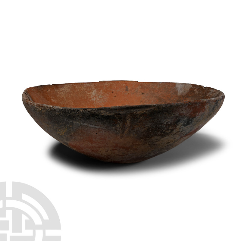 Late Bronze Age, circa 1450-1200 B.C.. Broad squat bowl with dished profile, rou...