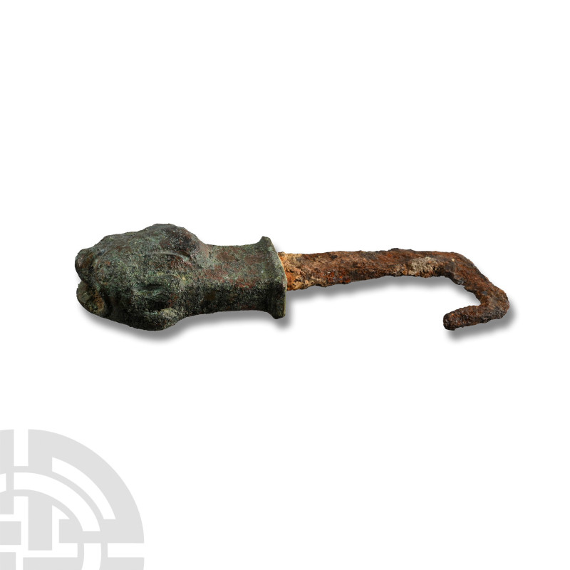 2nd-3rd century A.D.. With an iron shank; the handle with a large finial formed ...