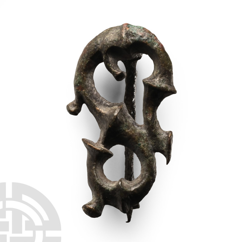 2nd-4th century A.D.. Plate brooch formed as an S-shaped La Tène scroll with tru...