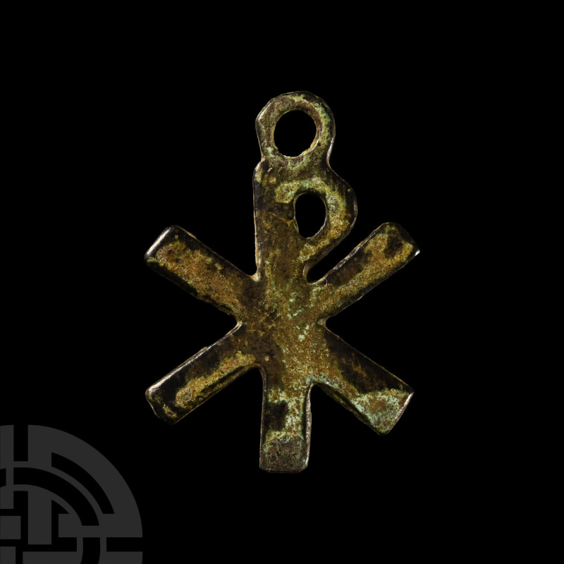 4th-6th century A.D.. Amuletic Christogram pendant with loop above. 2.71 grams, ...