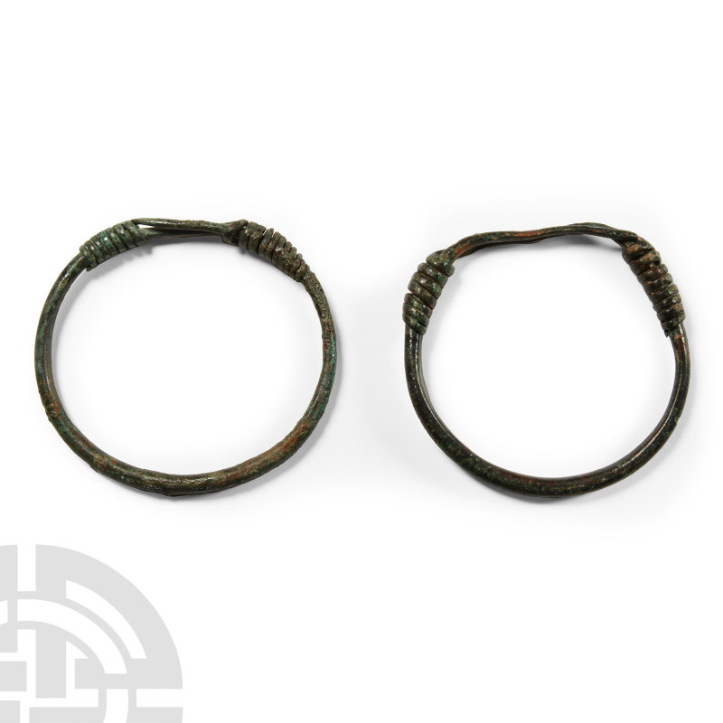 2nd-3rd century A.D.. Each a D-section hoop with the tapering ends coiled about ...