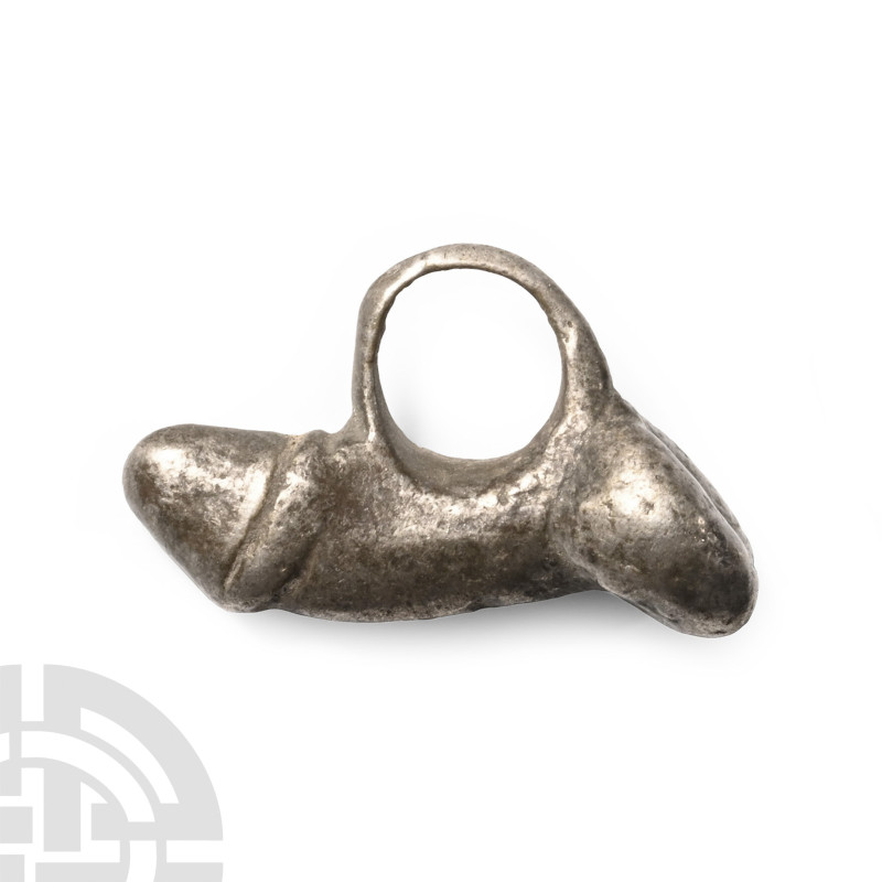 1st-4th century A.D.. Modelled in the round with a large suspension loop. 9.3 gr...