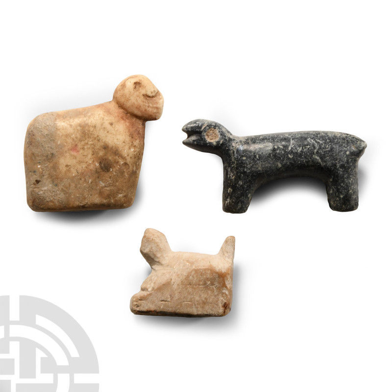 1st millennium B.C.. Modelled in the round, including a polished hound with inla...