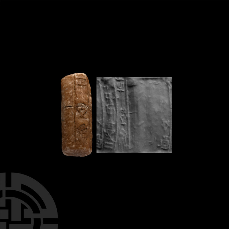 2nd-1st millennium B.C. or later. Steatite or talc with two columns of cuneiform...